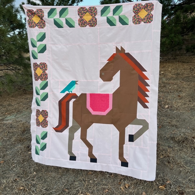 Unicorn Garden quilt top by Brook W.