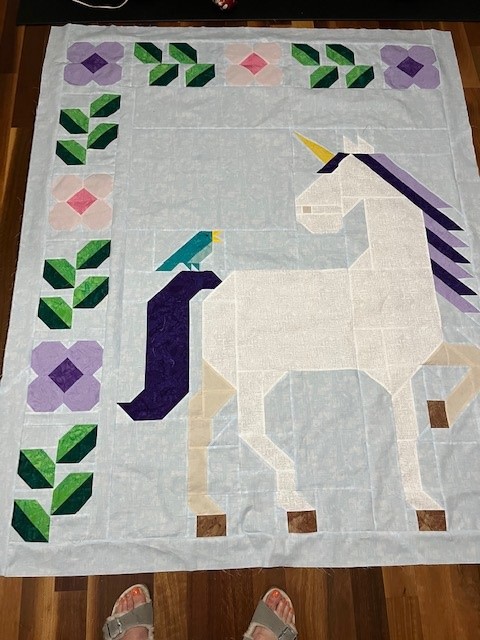 Unicorn Garden quilt top by Dawn C.