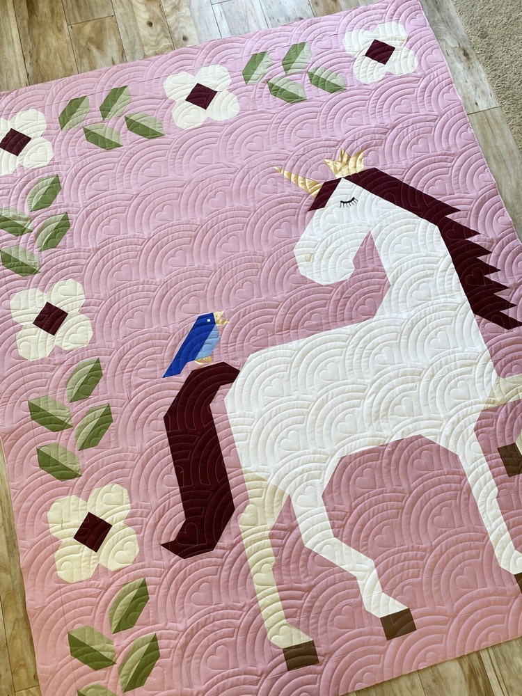 Unicorn Garden quilt top by Leticia F.